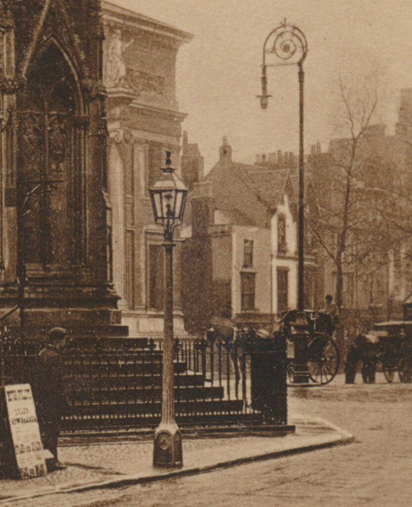 Early gas street lamps in a Victorian-era city